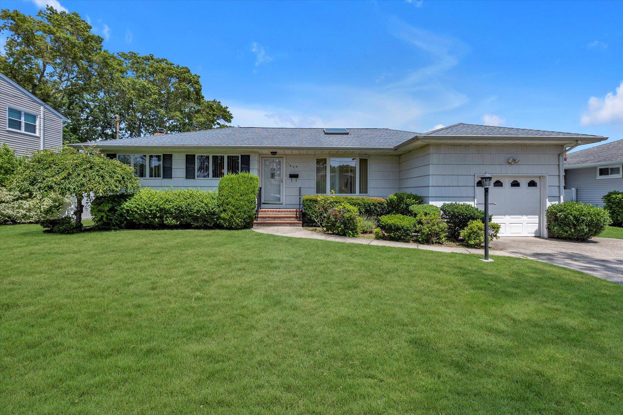 Wide line Ranch in the desirable presidential area of West Islip offers a solid home with great potential, featuring an updated roof and windows, a full unfinished basement with attic ...