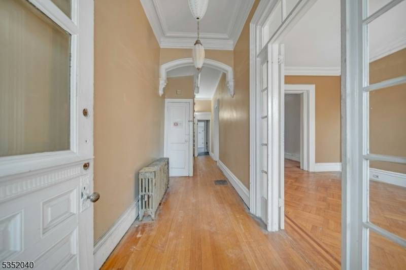 Turn of the century charm meets unlimited potential in this spacious 3 story Brownstone located in the heart of Newark.