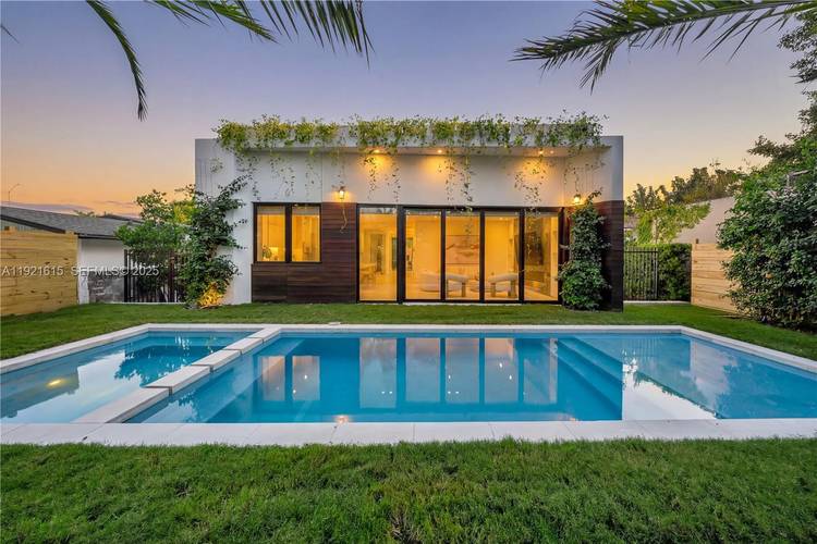 Introducing a striking contemporary residence where minimalist design meets warm, organic finishes.