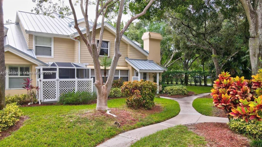 Beautifully updated townhouse for sale in the only community in the Meadows with a 24 7 manned gated entrance.