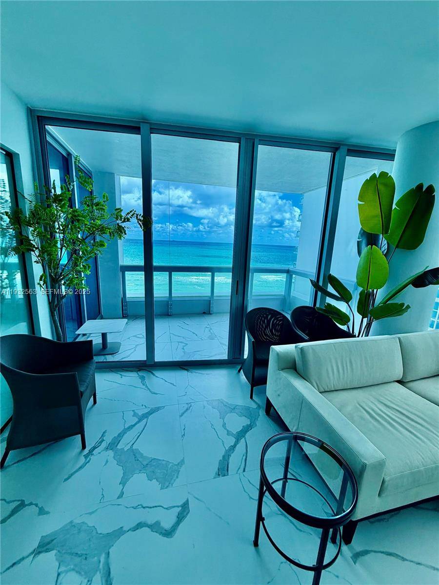 Live the ultimate ocean view lifestyle in this impeccably renovated 2 bedroom, 2 bath corner residence at the prestigious Carillon Miami Wellness Resort North Tower.