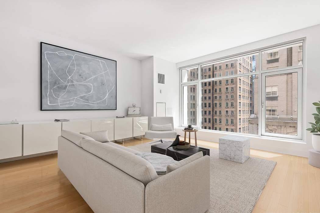 Rarely available full floor home on the 12th Floor at Number 5 Condominium.