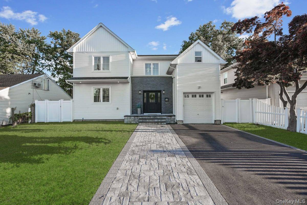 Welcome to this beautiful home in the heart of Plainview, within the award winning Plainview Old Bethpage School District.