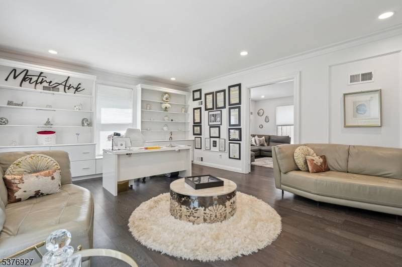 Located in the historic gated community of Llewellyn Park.