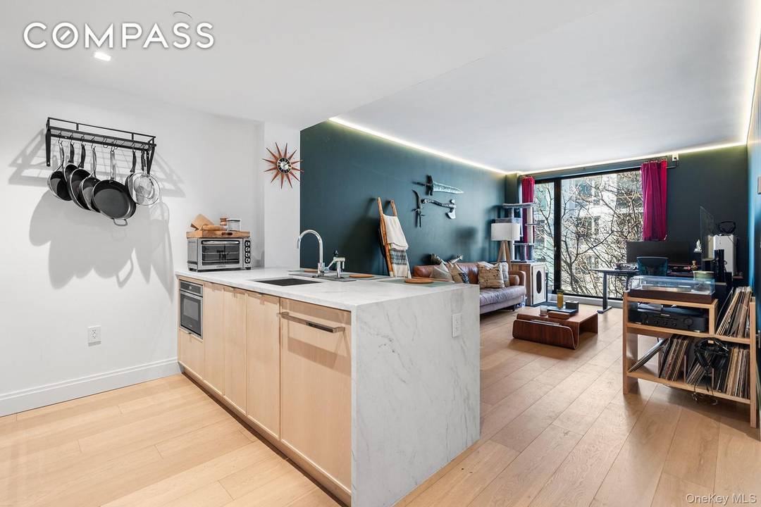 Welcome to modern living at 37 14 34th St in vibrant Queens, NY !