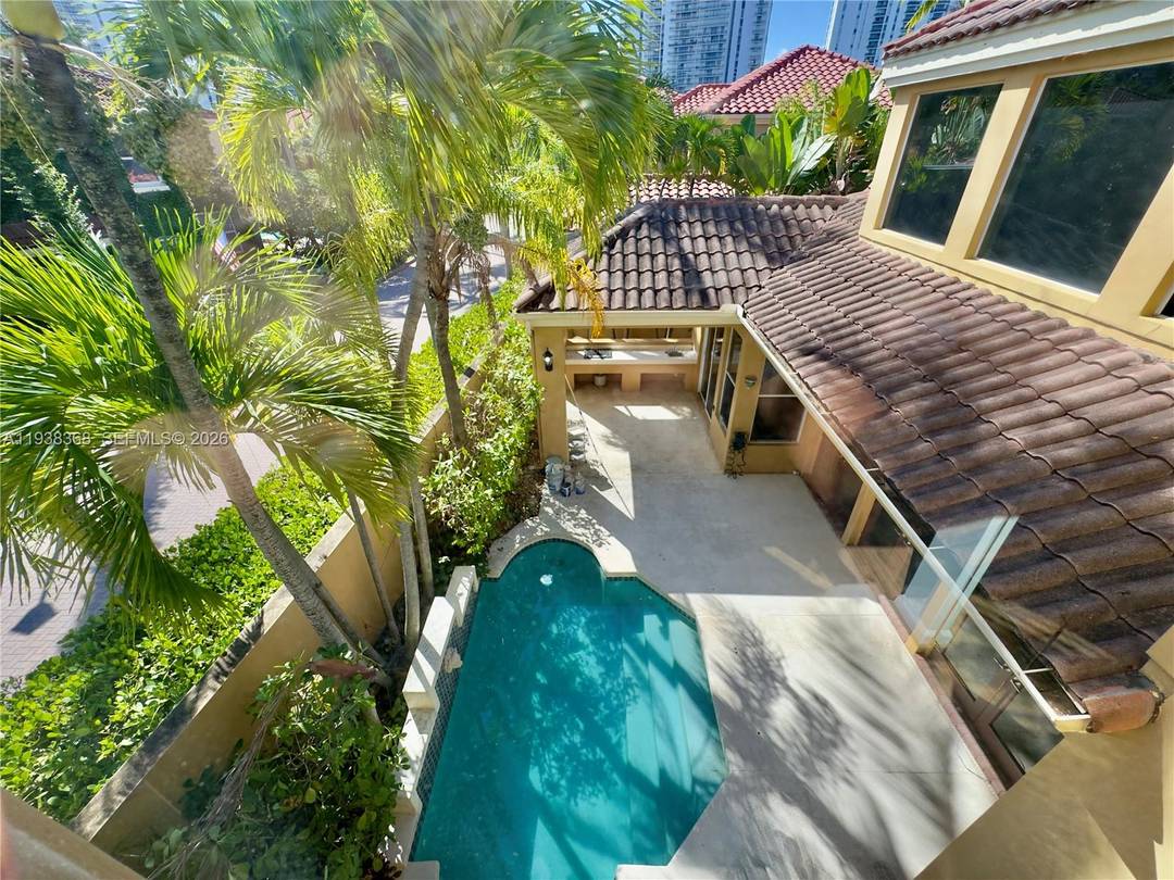 Best priced single family home in Island Way, a private gated community in Aventura.