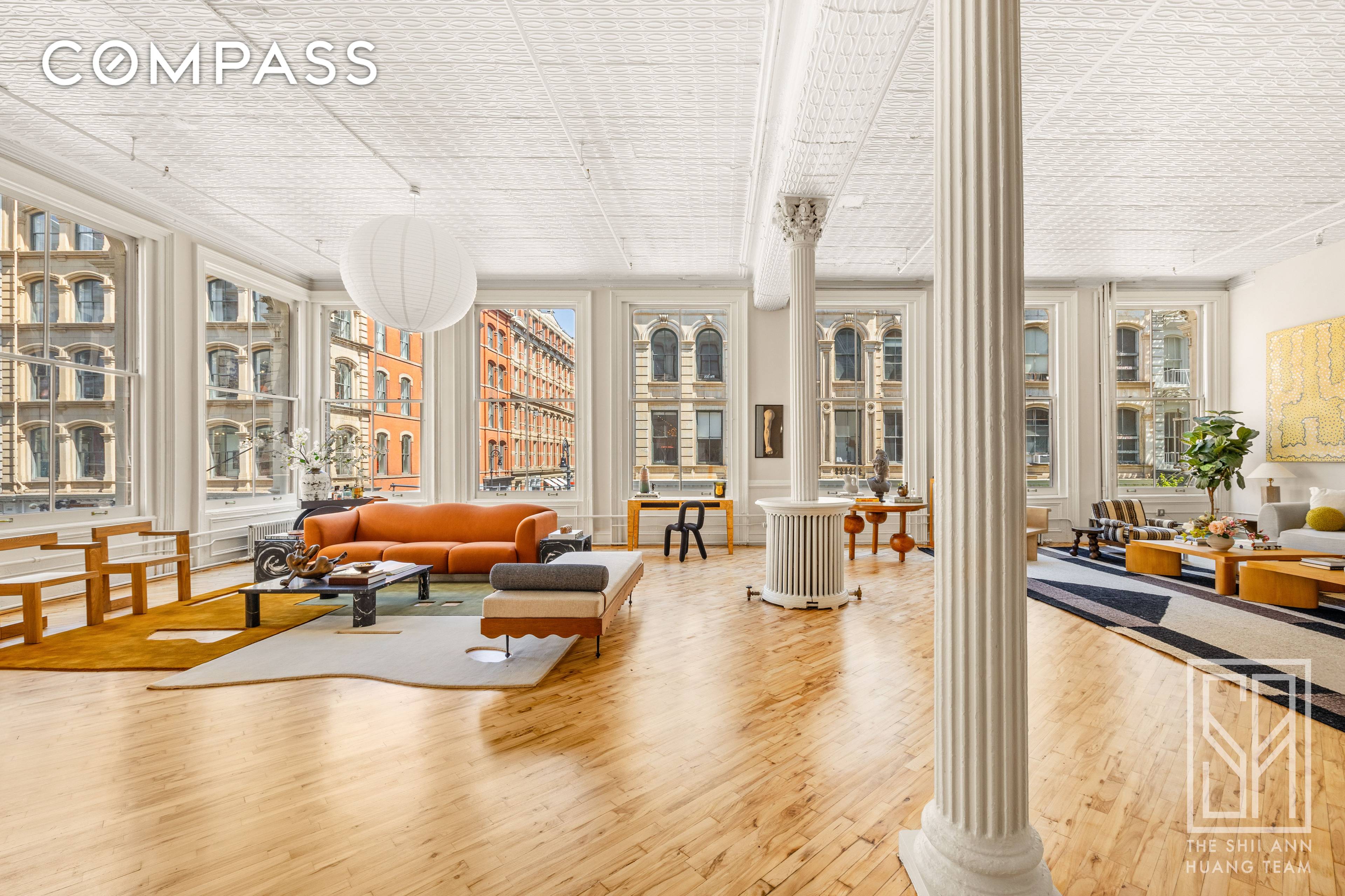 Dramatic amp ; rare 2, 500 sq ft loft condo located in the heart of Soho in a restored 19th century cast iron building.