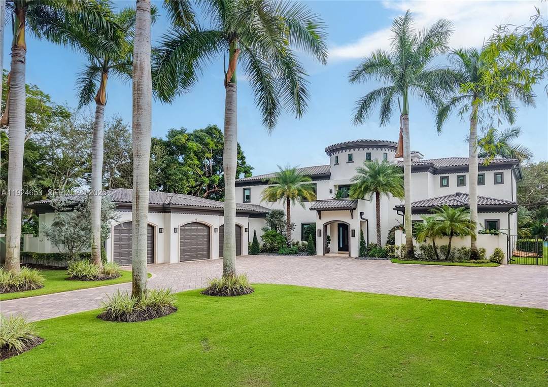 Located in a prime Pinecrest neighborhood with top rated schools, this gated estate offers 7 beds, 8.