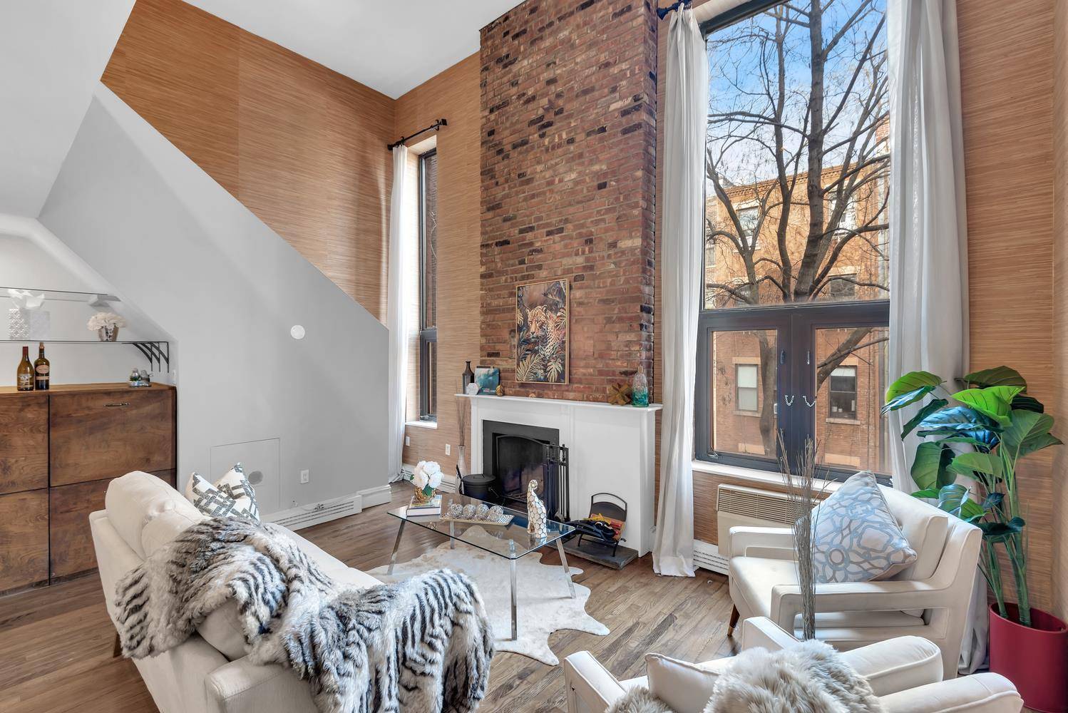 This stunning two bedroom, two bathroom duplex seamlessly blends pre war charm with modern updates, offering a unique city retreat in a prime Upper West Side location just a block ...