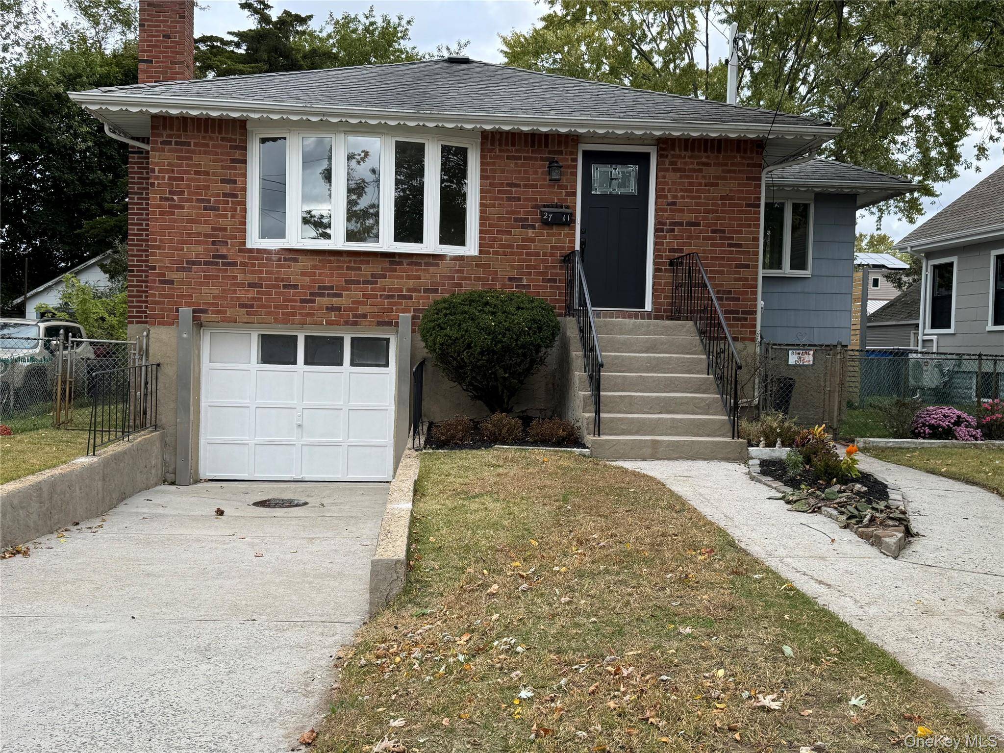 Move right in to this comfortable updated and completely redone Raised Ranch house with attached show room finished garage and extra room for your mom.