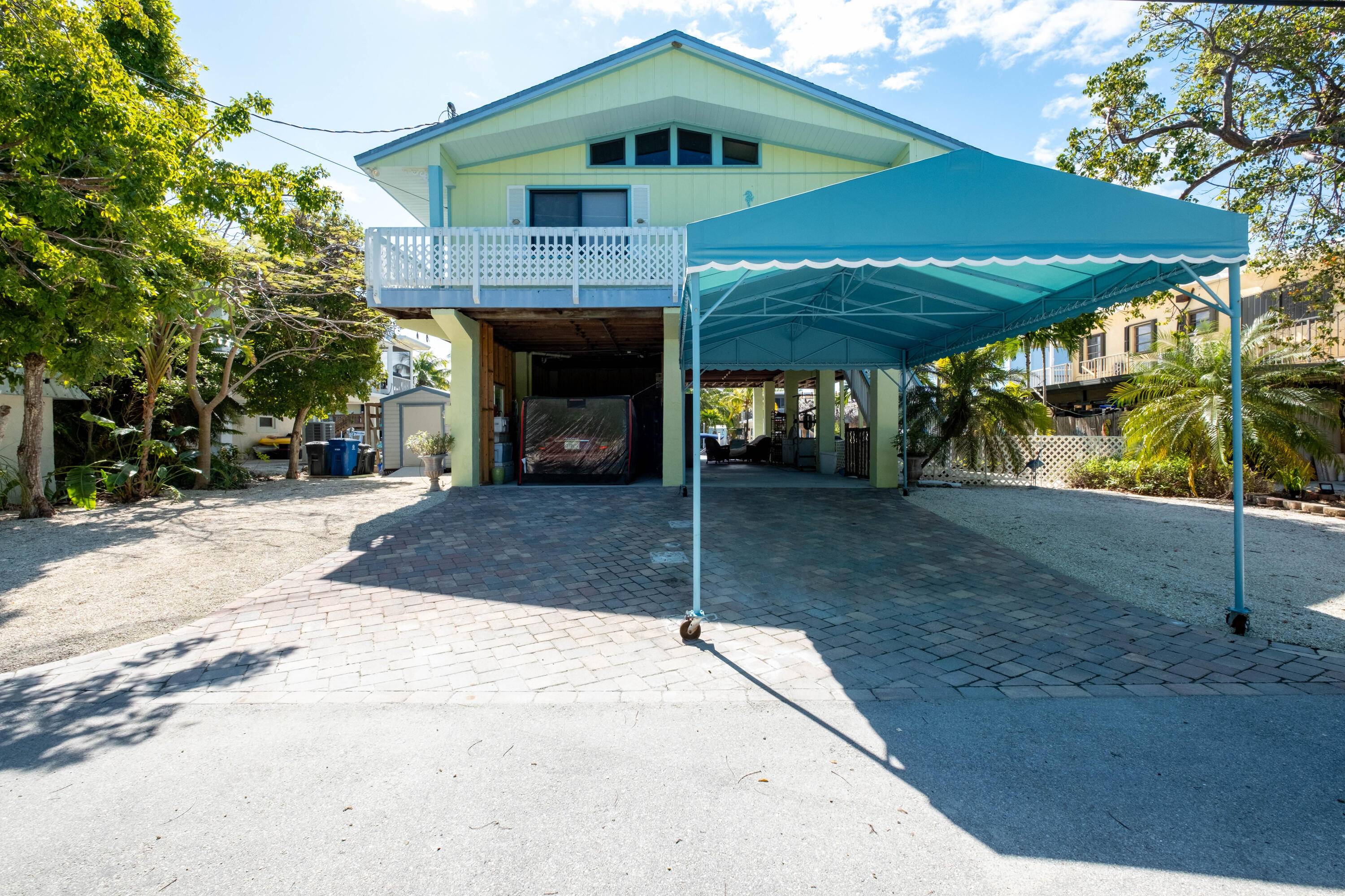 Don't miss out on this east of US 1 canal front home with amazing views.