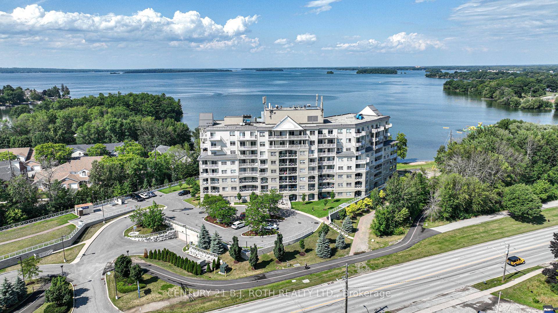 Welcome to this beautifully updated 2 bedroom, 2 bathroom end unit condo, perfectly positioned to offer panoramic water views from nearly every room.
