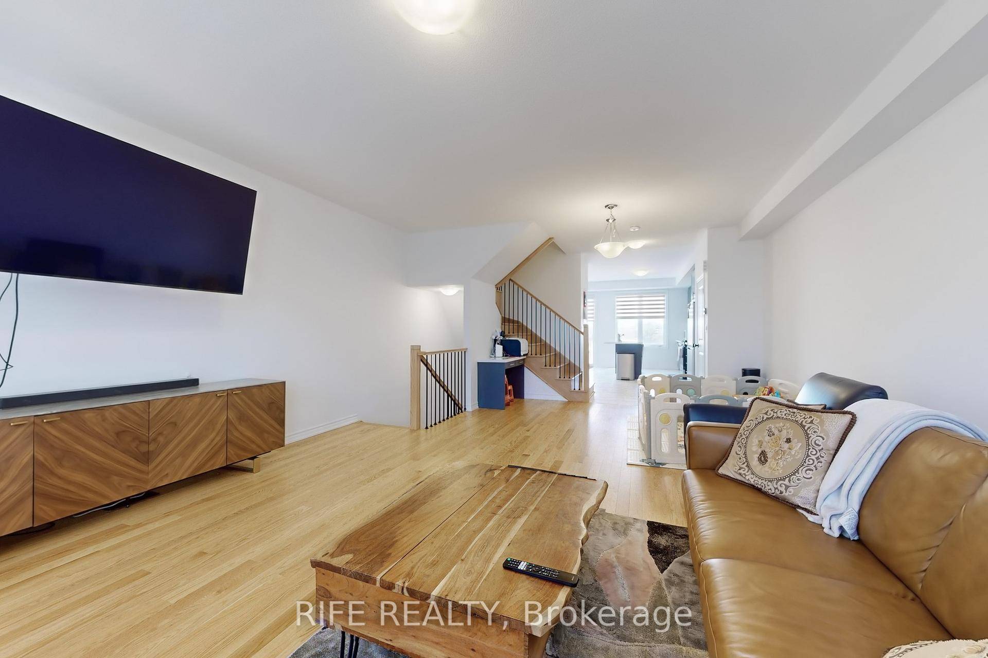 A pristine, sun filled 2 year old freehold townhome in the prestigious Brampton East community, situated on a premium lot backing onto green space.