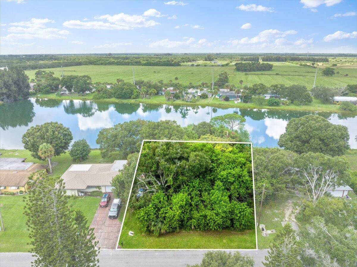 An oversized. 27 acre lakeview lot just a short walk or bicycle ride away from the Lakewood Regional Park.
