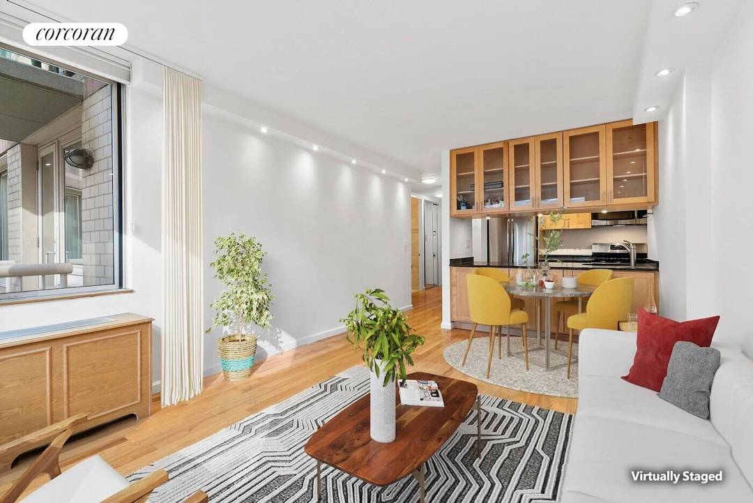 Residence 3HH at 393 West 49th St is a luminous one bedroom corner apartment that offers views of the tranquil residents courtyard and features a private balcony accessible from the ...