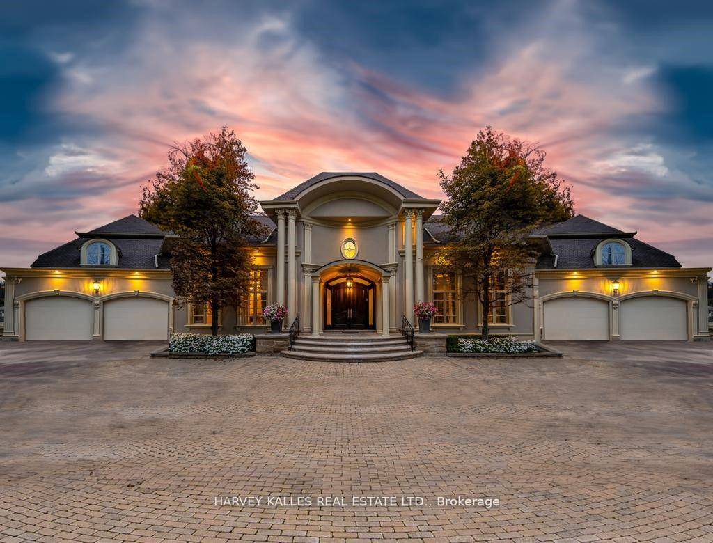 Welcome Home to 48 Wimpole Drive, a breathtaking, freshly renovated home nestled on a gated, estate sized lot in the prestigious St.