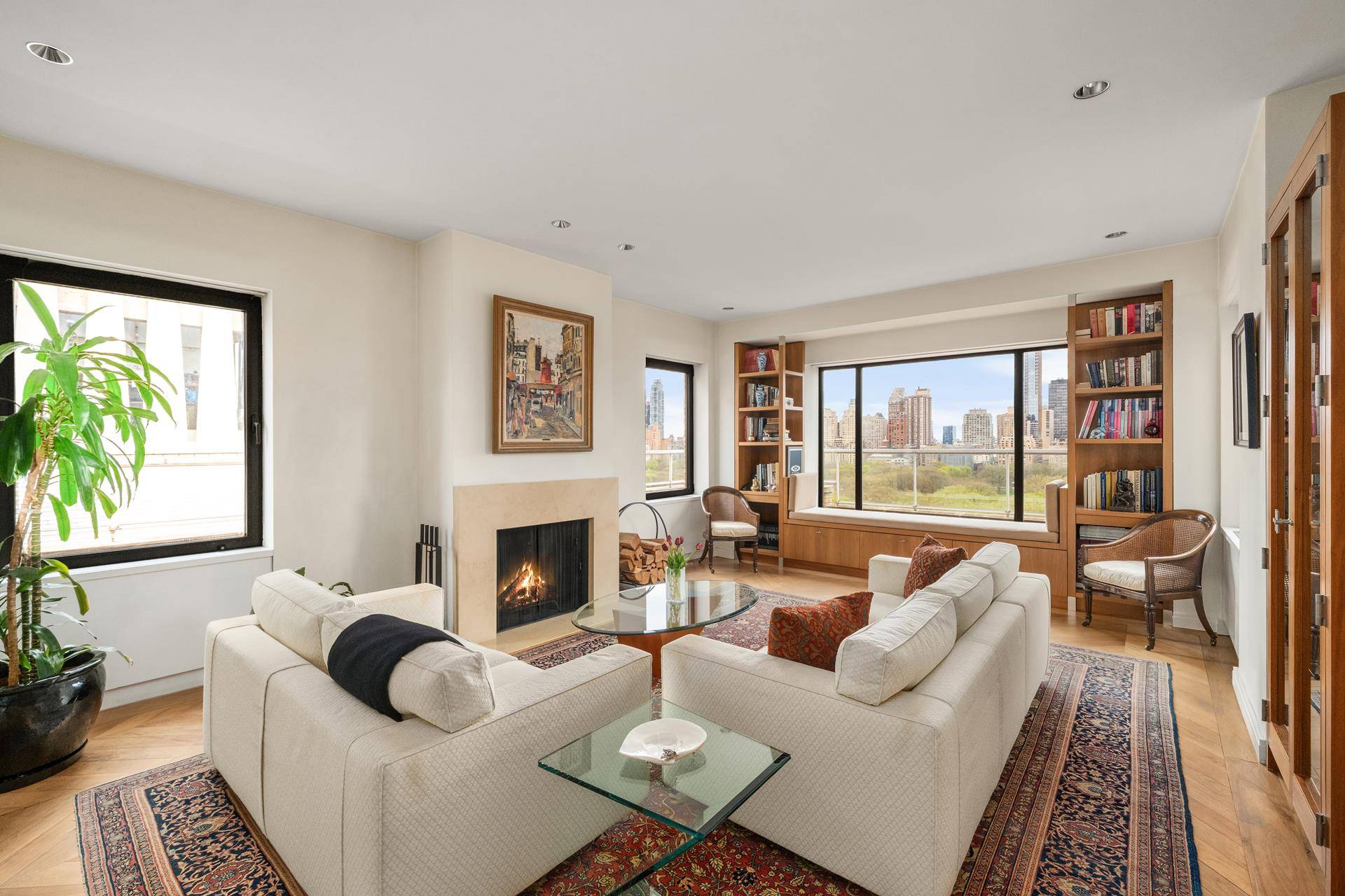 Perched atop the 20th and 21st floors of a premier Fifth Avenue cooperative, this grand, sun flooded 11 room duplex penthouse offers panoramic Central Park views, refined interiors, high ceilings, ...