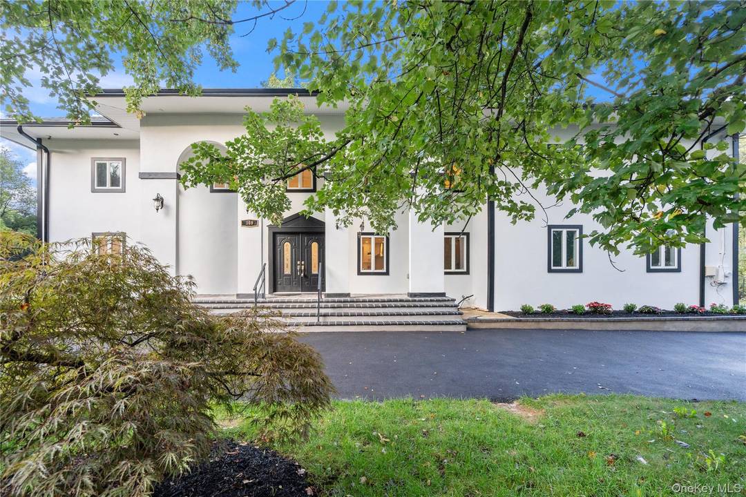 Welcome to this exceptional 6 bedroom colonial with a versatile 7th room perfect as a home office, gym, or guest space.