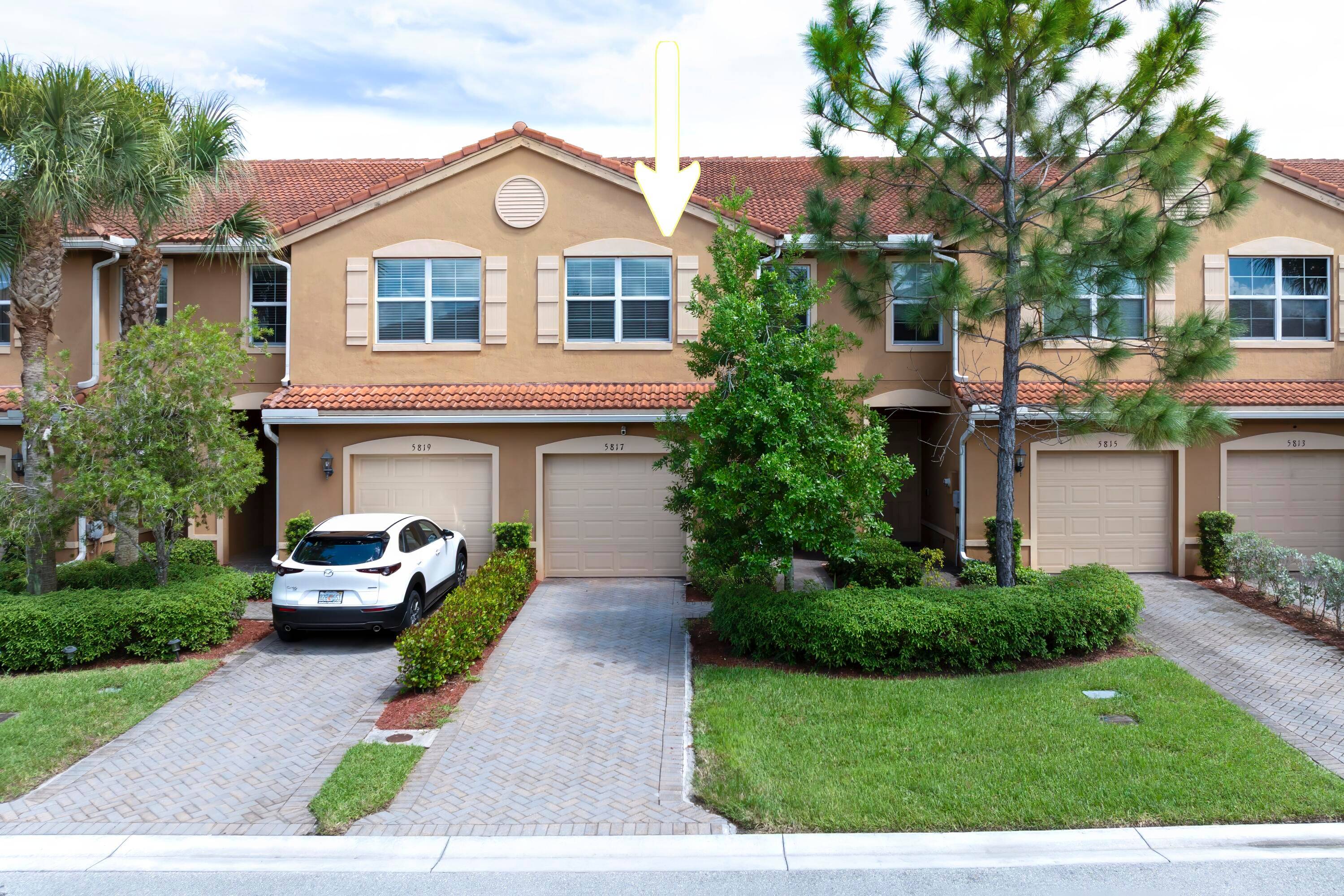 Welcome to your dream property located perfectly between the vibrant Downtown Lake Worth Beach and the tranquil horse country of Wellington.