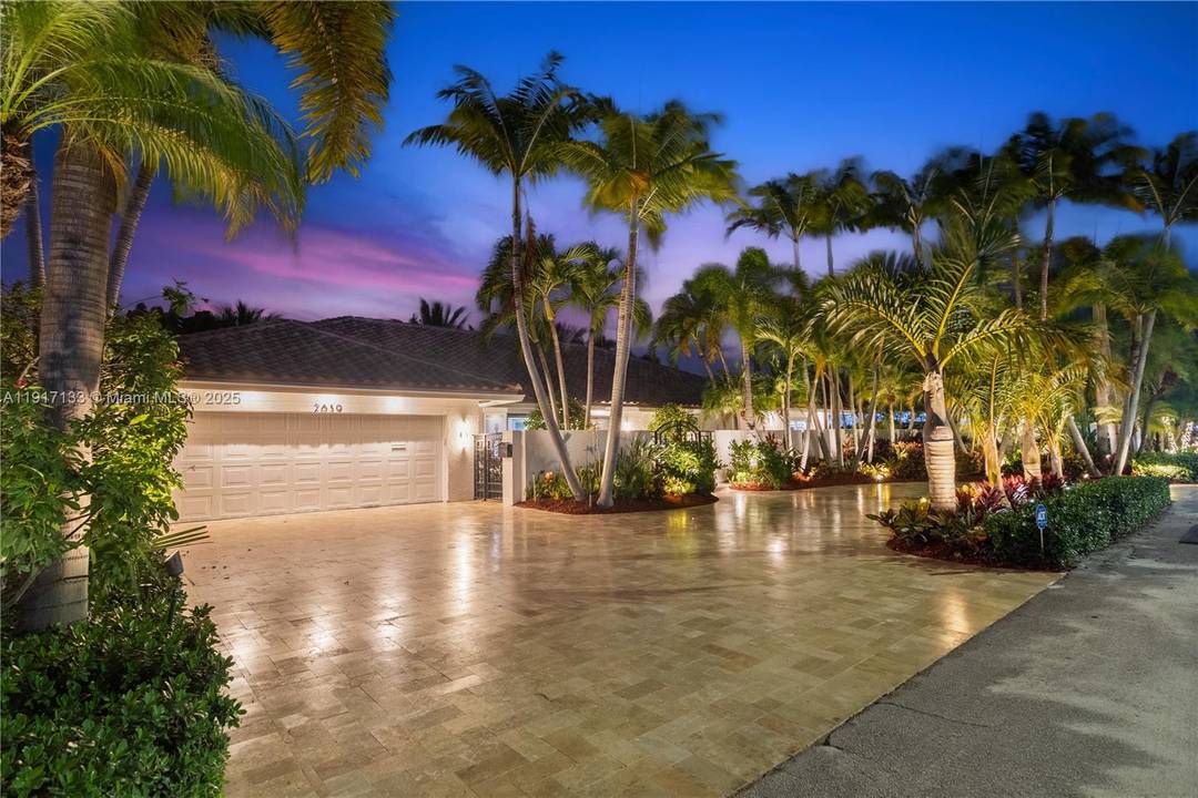 Indulge in this luxurious waterfront retreat in Coral Ridge, where sophisticated living meets boater s paradise.