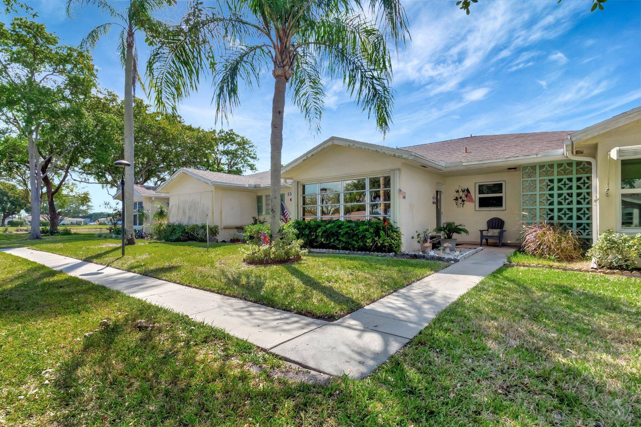 Enjoy panoramic lakefront views from this beautifully renovated villa in High Point West !
