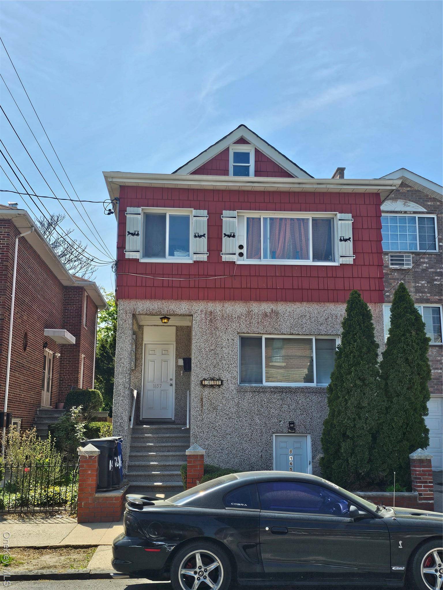 Discover a fantastic opportunity with this legal three family home, perfectly situated in a highly sought after neighborhood.