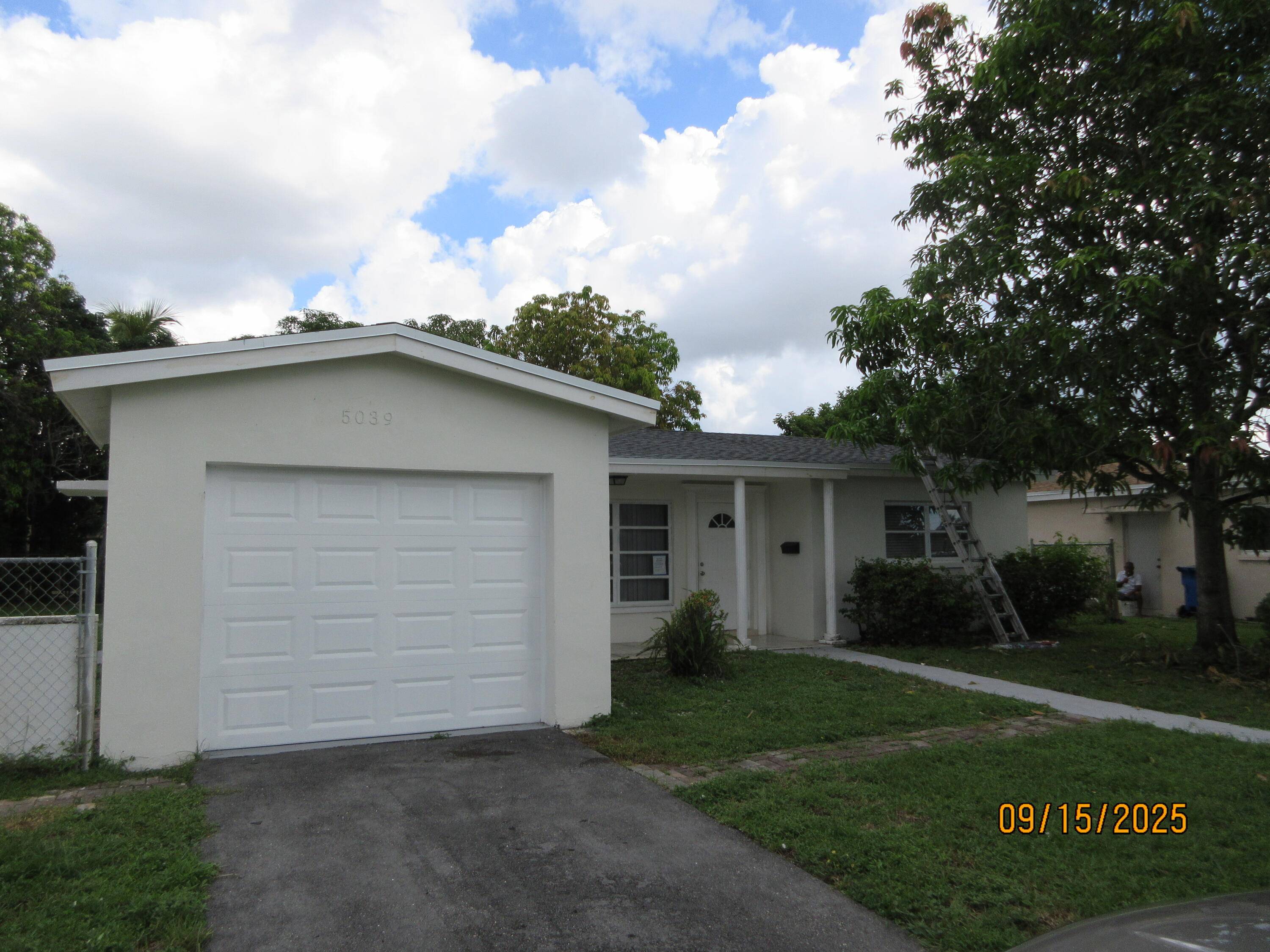 Spacious 2 1 1 car garage, Updated kitchen, fresh interior and exterior paint, with tile flooring.