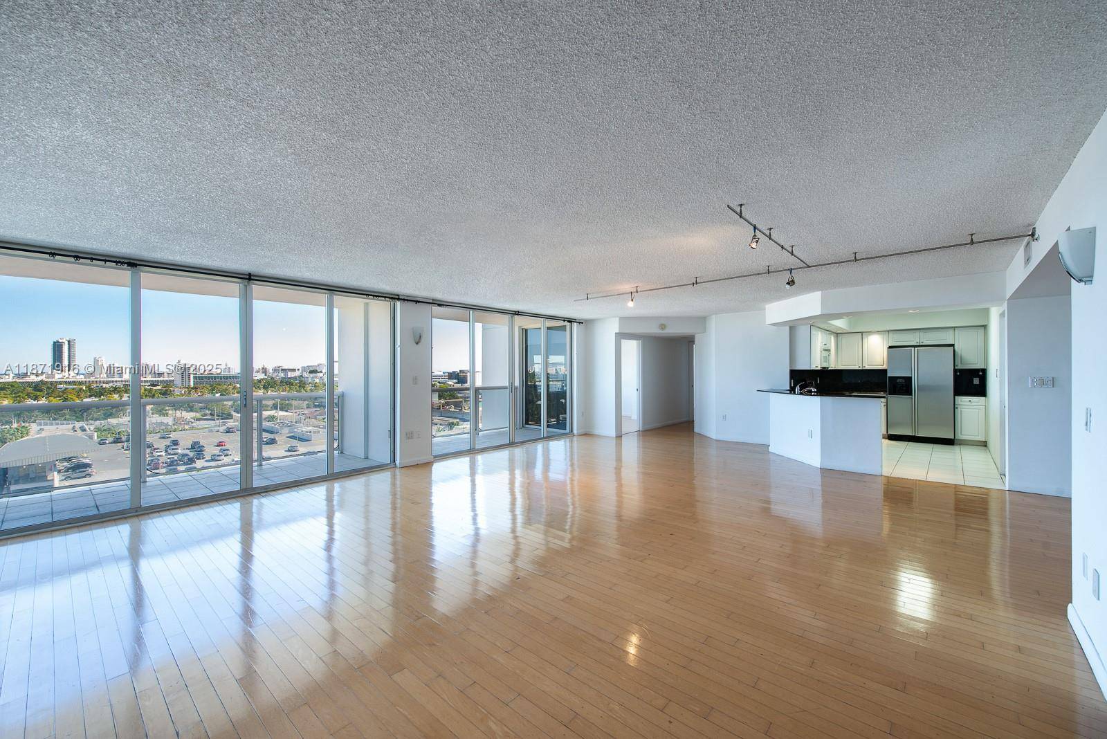 Rare Combined Unit at Sunset Harbour 3 Bed Den 2, 000SF Unique Two units merged into a luxurious, expansive home with a double living room and open dining area.