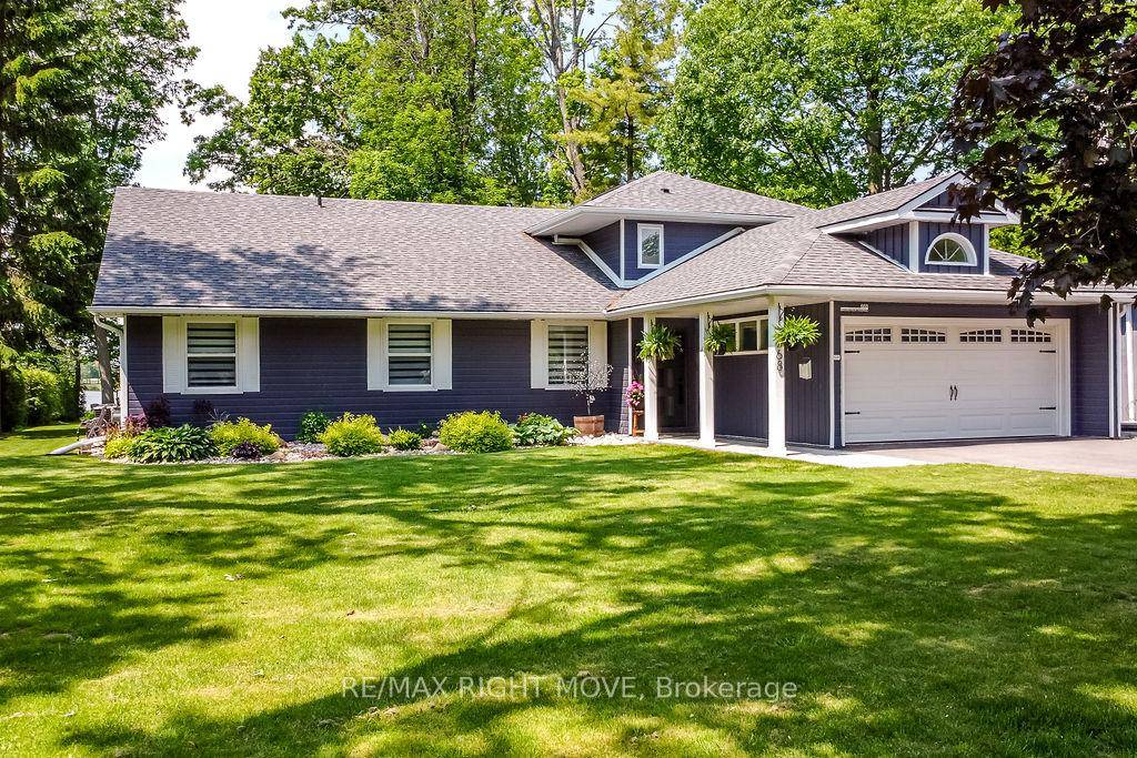 Welcome to this exquisite, professionally renovated waterfront property on Orillia's highly sought after Couchiching Point.