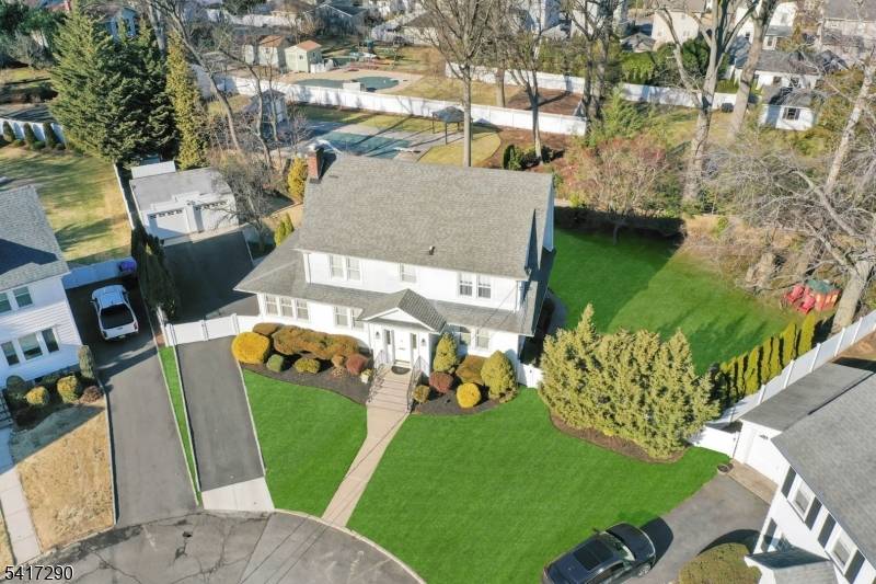 This elegant Colonial presents a rare opportunity to live at the end of a quiet cul de sac in the heart of the Borough of Trees.