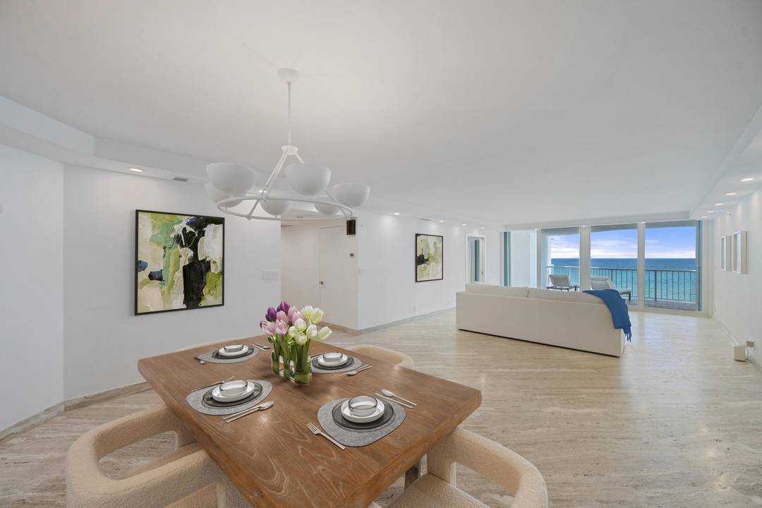 Step into this stunning 6th floor residence at The Enclave's North Building, where southern exposure floods the space with natural light and showcases sweeping views of the ocean, pool, and ...