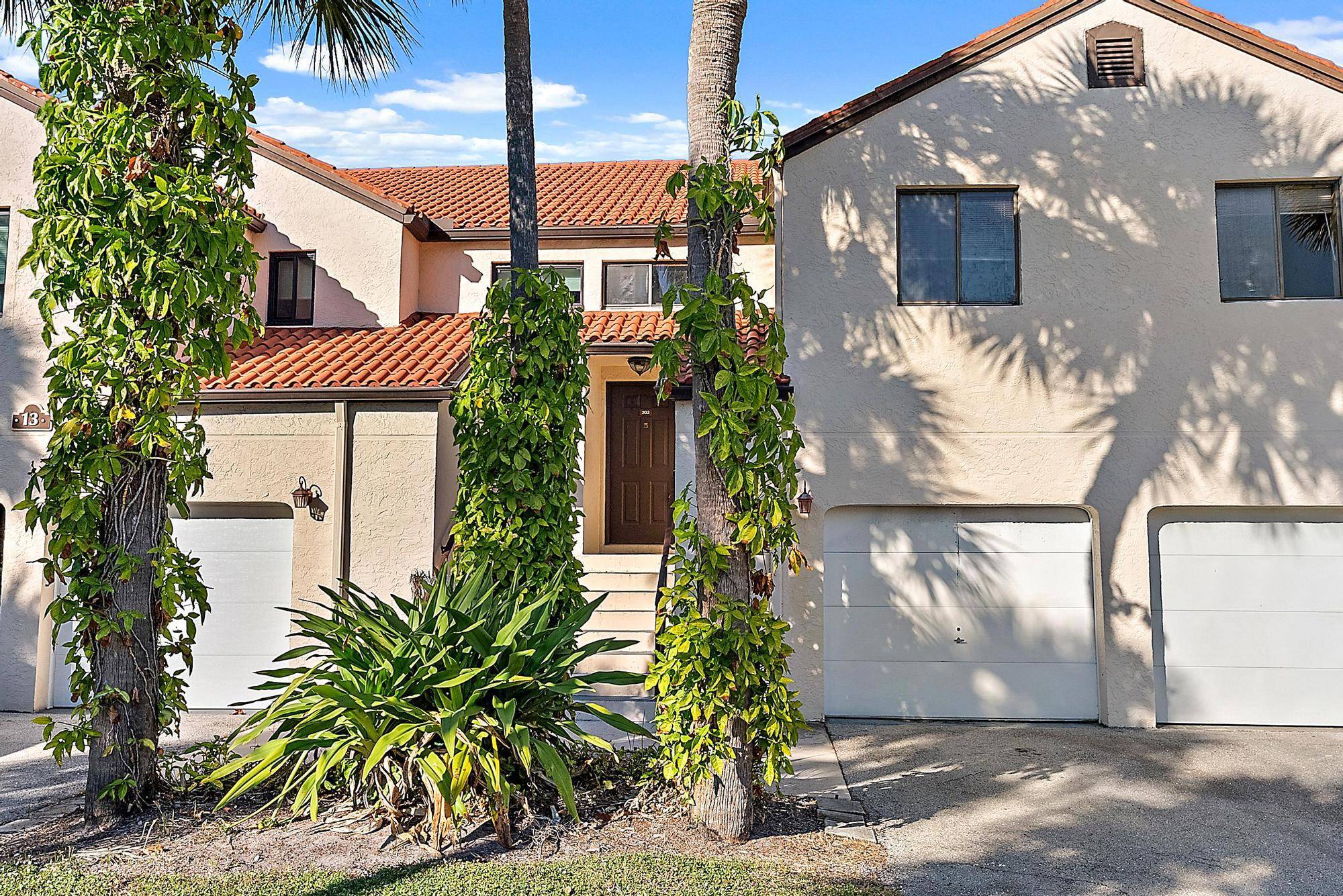 Charming 3 2 luxury townhouse with garage in beautiful gated community.