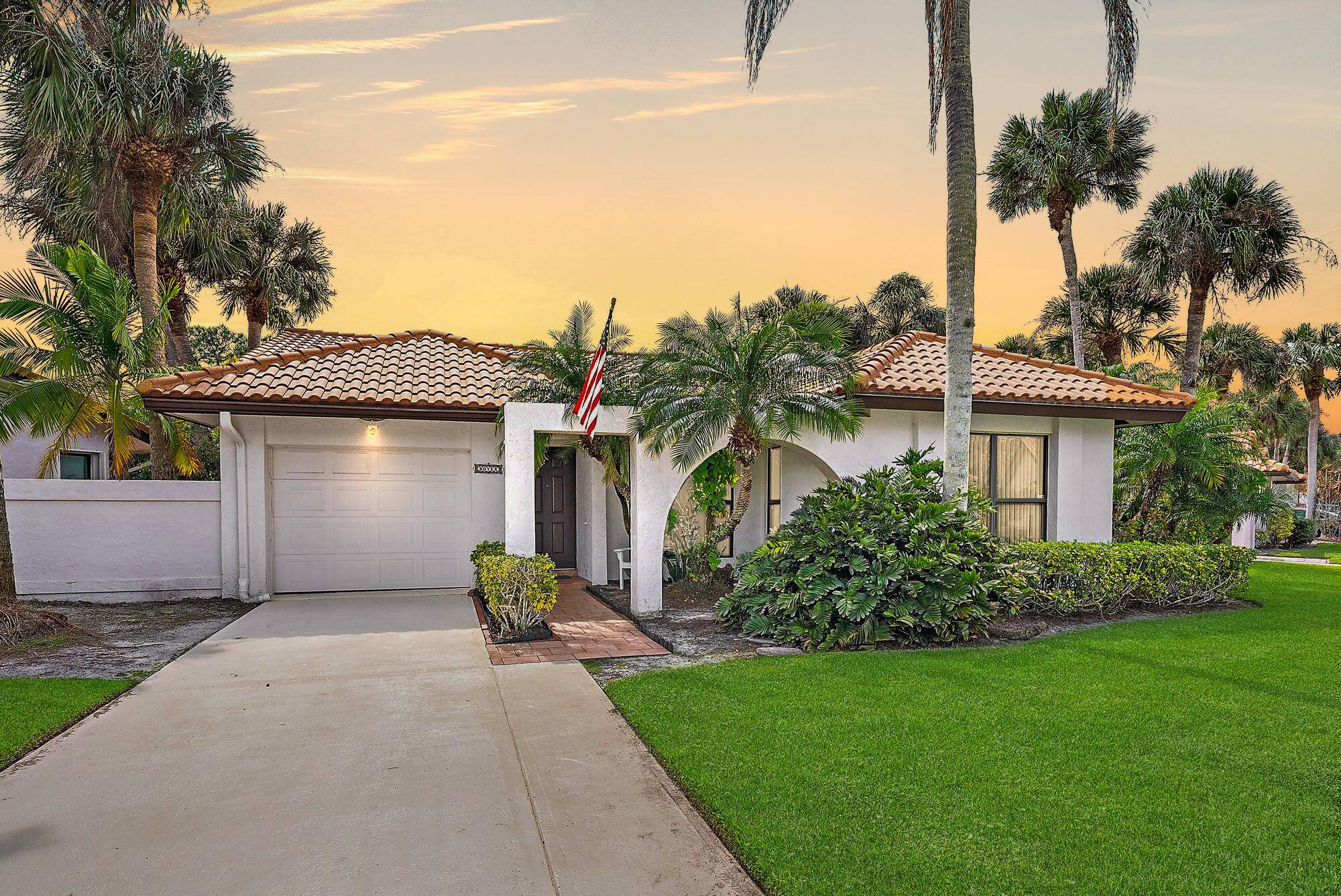 Welcome to this beautifully maintained three bedroom, two bathroom home in the sought after Martin Downs Golf Community, located on a spacious corner lot.