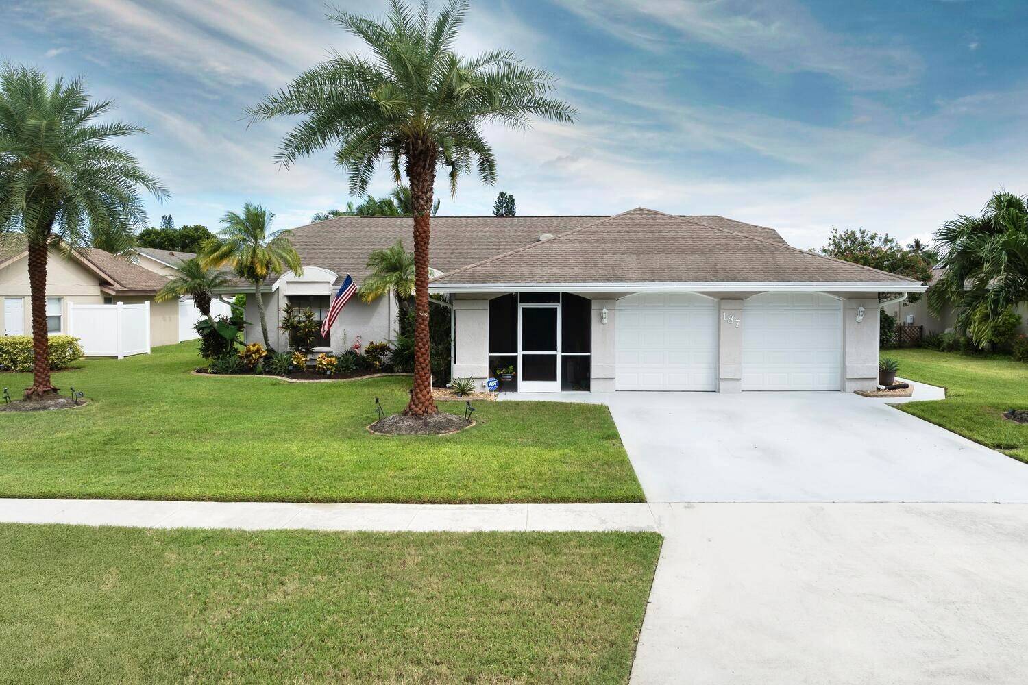 Welcome to this waterfront oasis in the heart of Royal Palm Beach.