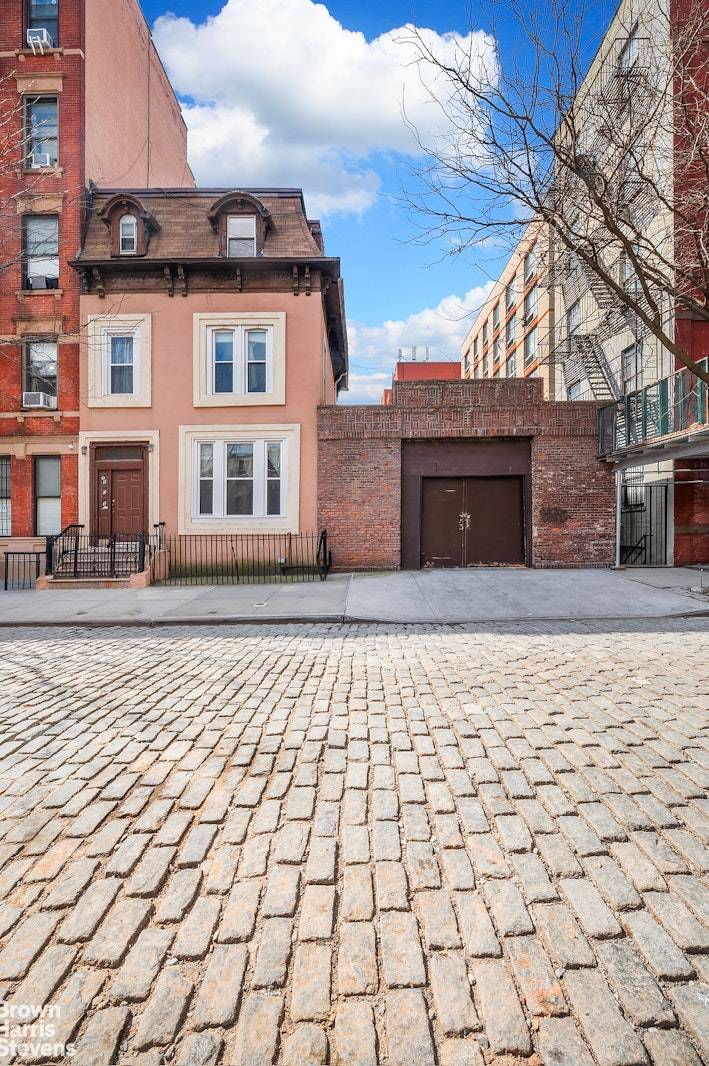 Rare Townhouse amp ; Garage Combination in East Harlem Prime Development Potential A truly unique find in East Harlem, this three family townhouse with an attached garage offers an exceptional ...