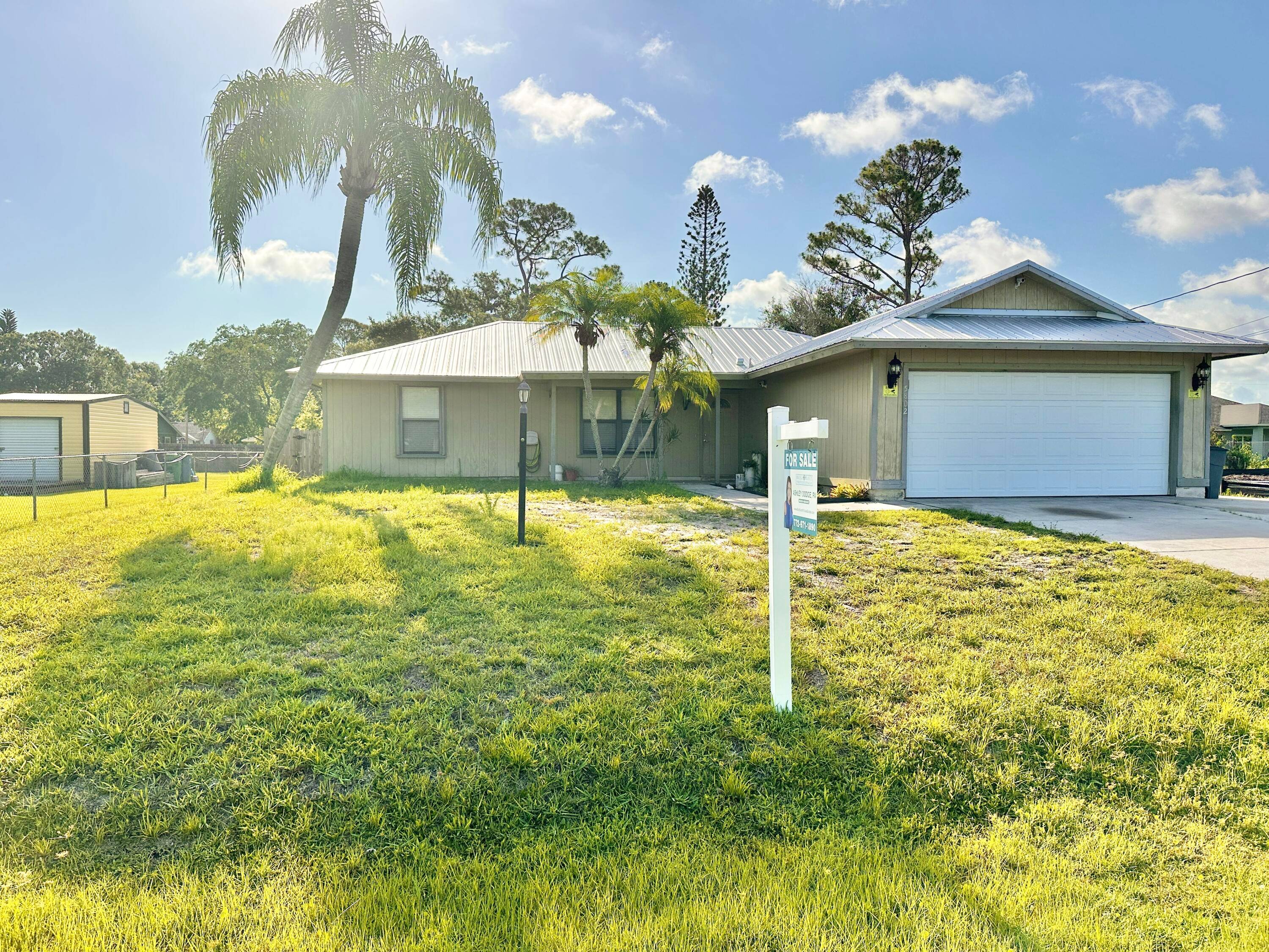 Welcome to your charming Key West Style Pool Home, nestled in the heart of Indian River Estates.