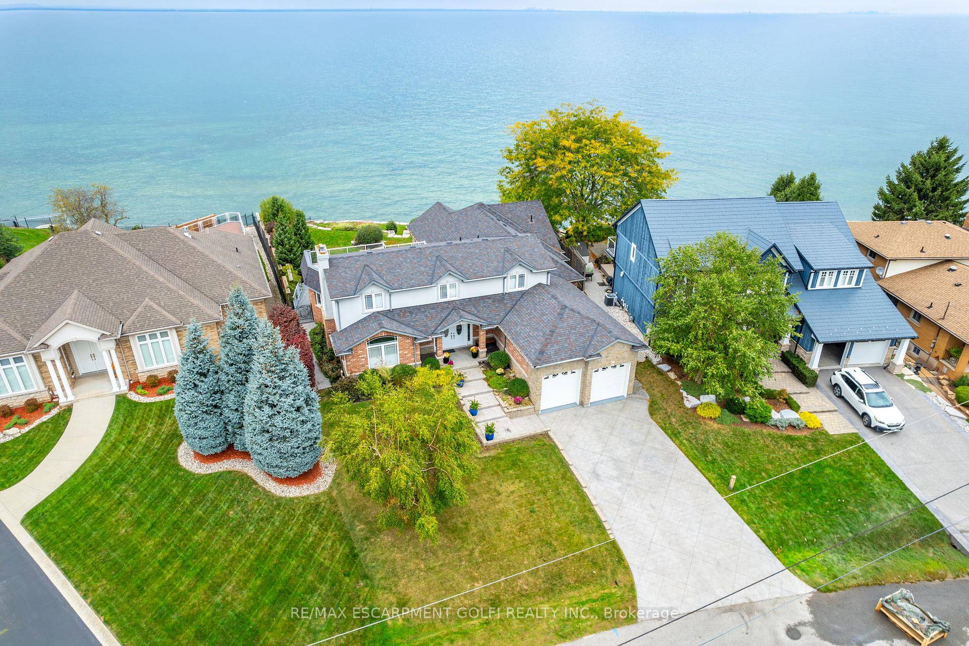 Welcome to this breathtaking 4 1 bed, 4 bath waterfront home, where modern luxury meets serene lakeside living.