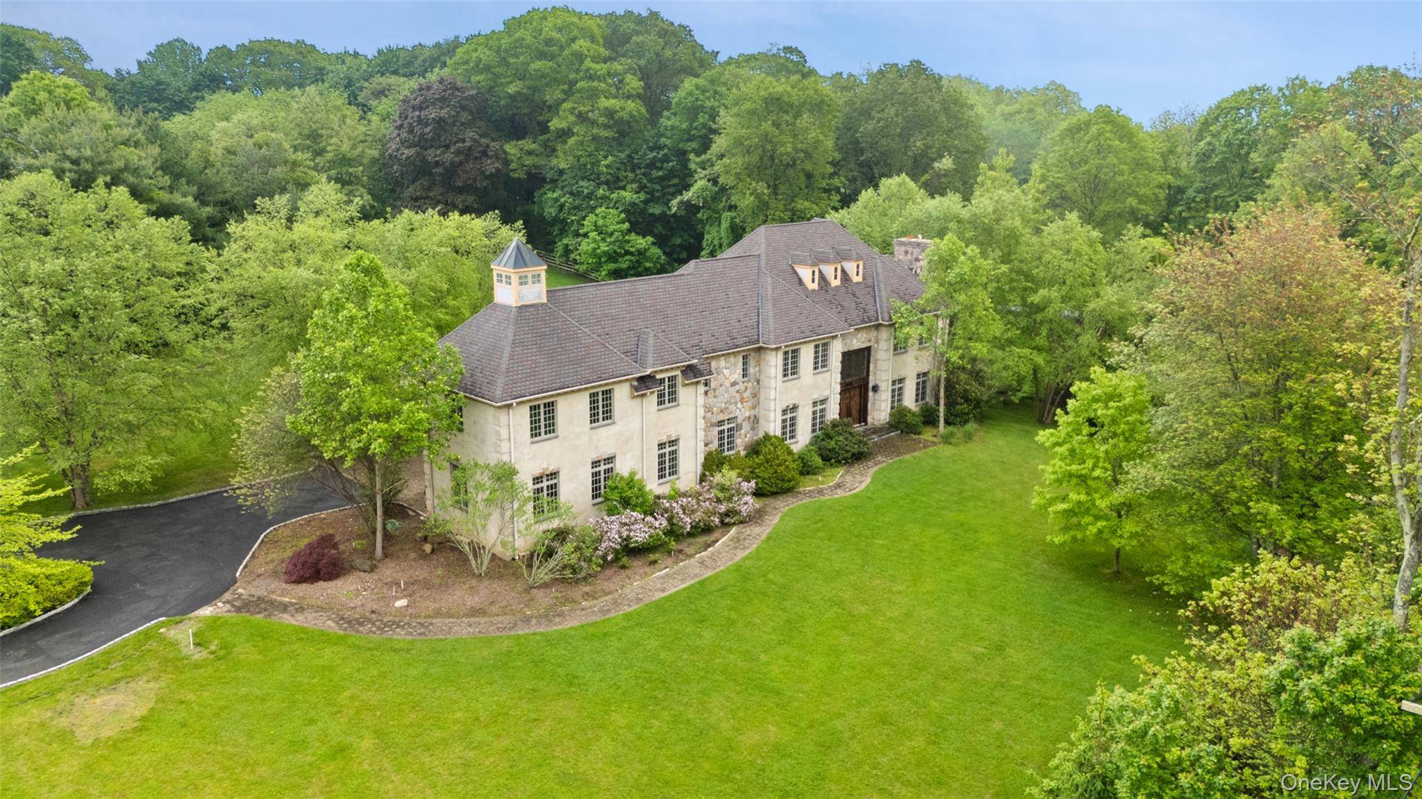 Experience refined living in this breathtaking 5, 600 sq ft contemporary estate, masterfully crafted in 2006 and remodeled in 2023, with stone, stucco, oak, and timeless design.