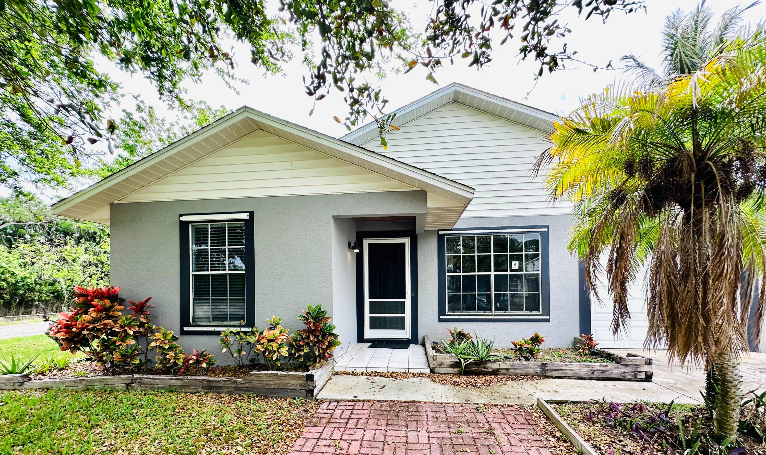 Welcome to your new haven at 5360 Southeast Dell Street in Stuart, FL !