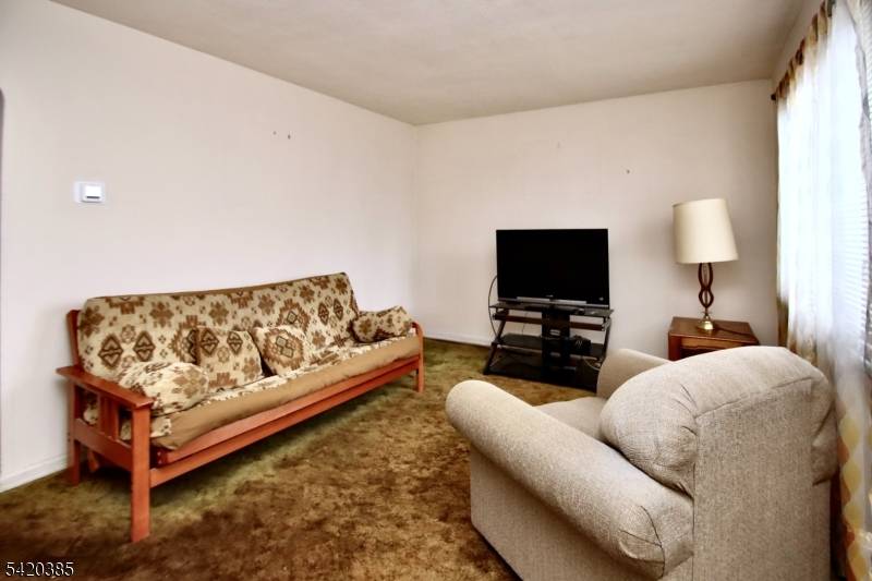 Great curb Appeal and dormered in Front Calling all investors and do it yourselfers to create your own touches to make this property your own.