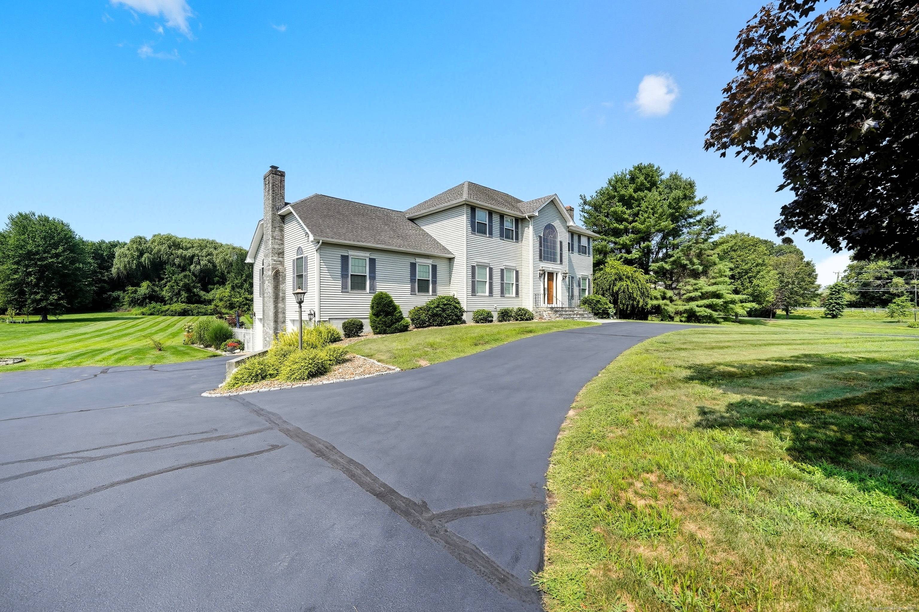 Welcome to 1 Meadow Wood Dr, Suffield, CT, the distinguished model home of the neighborhood, crafted by the renowned Briarwood Homes and lovingly kept by the original owners since.