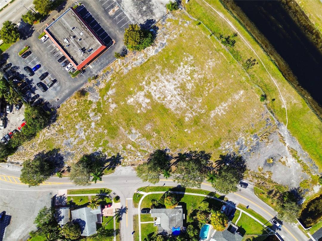 Prime commercial redevelopment site offering exceptional visibility and access along one of Broward County s busiest corridors, with 55, 500 vehicles per day and direct exposure to State Road 7 ...