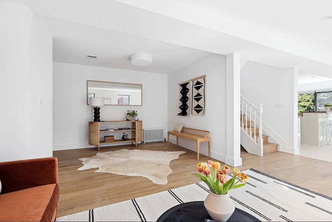 A rare offering in Red Hook, 104 King Street is a stunning two family townhouse spanning approximately 4, 400 square feet across two beautifully proportioned residences.