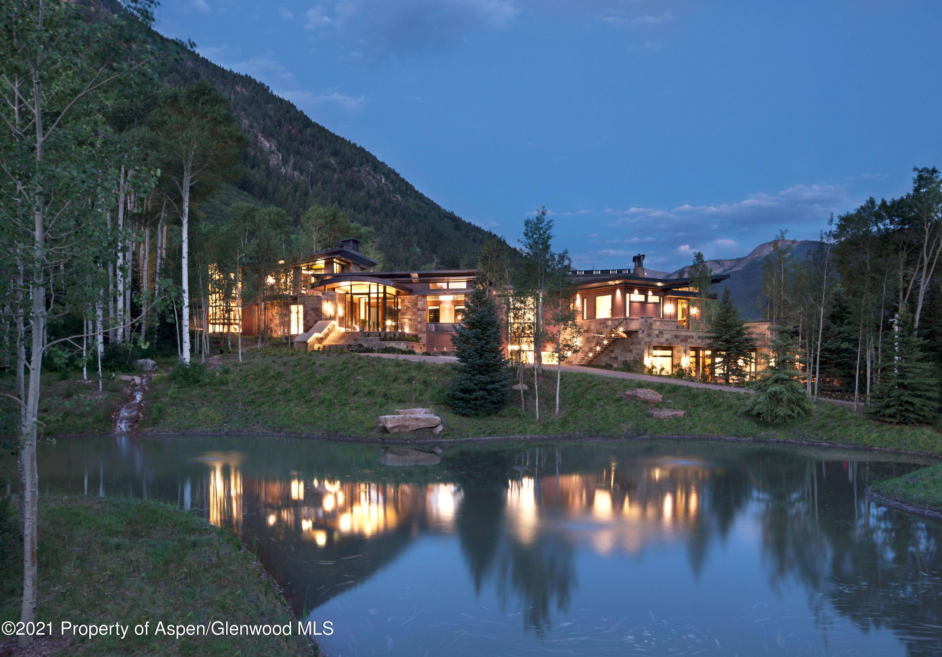 This award winning home is perfectly positioned to enjoy the unobstructed view of morning sunrises and evening sunsets on 5.