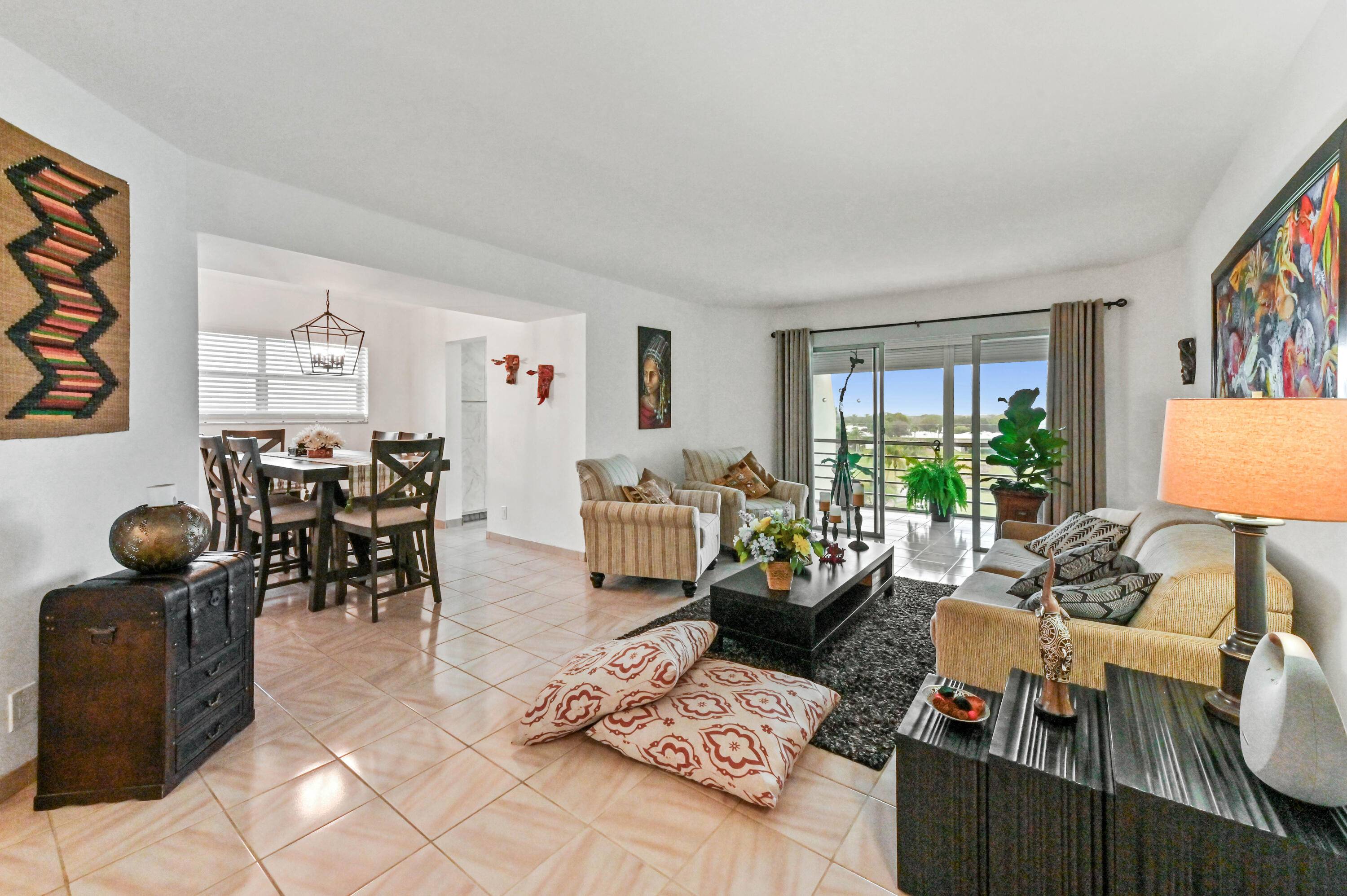 Welcome to this stunning corner condo, where breathtaking golf course views stretch wide and deep, creating a serene backdrop for everyday living.
