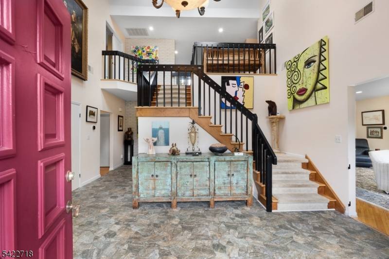 Tucked away on a quiet cul de sac in desirable Denville, 4 Chadwick Court blends comfort, privacy, and convenience in one of Morris County's most sought after communities.