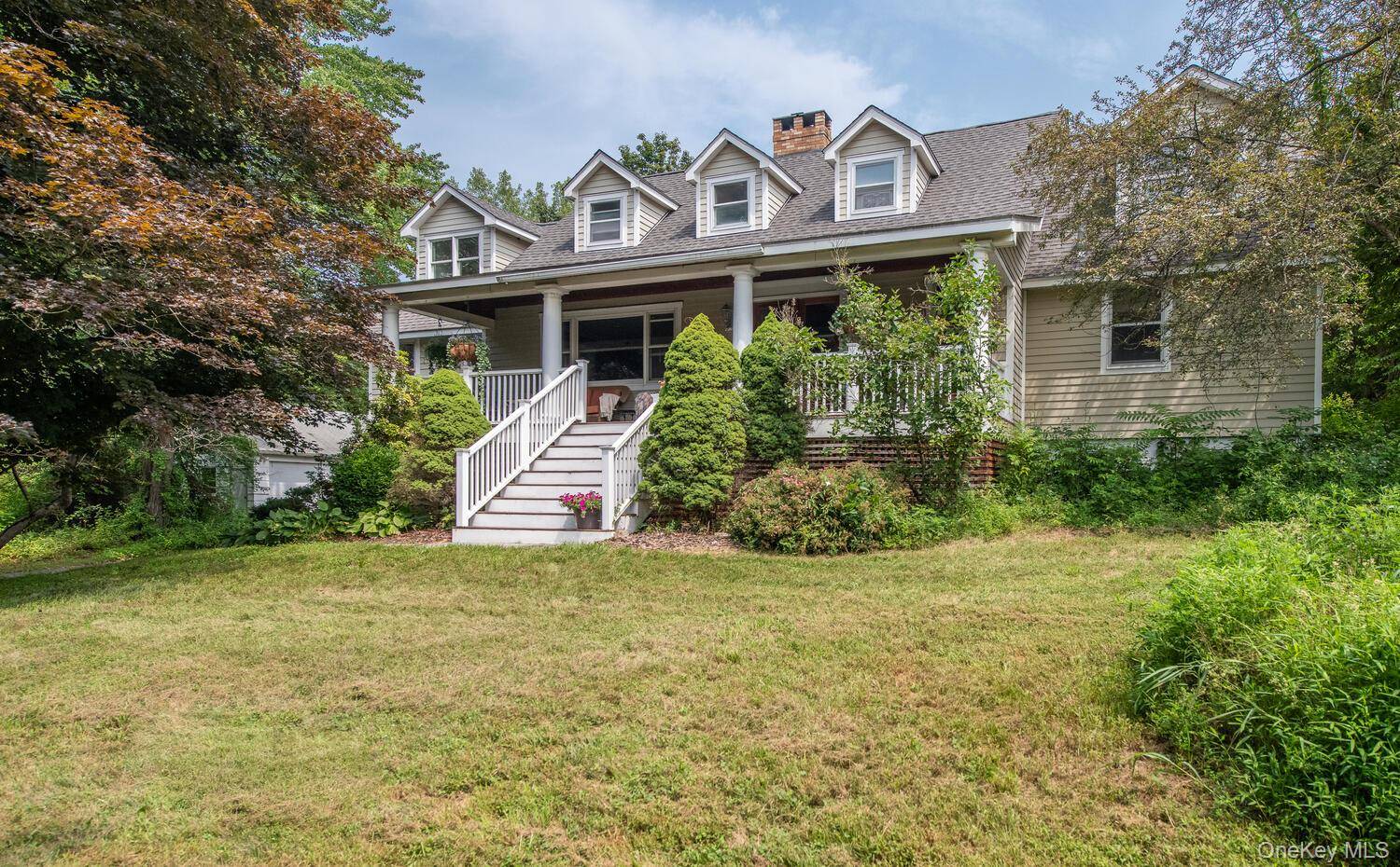 Minutes from Charming Red Hook Village Private Parklike Retreat Tucked away on a serene cul de sac in a park like setting with protected views, this inviting 4 bedroom, 2.