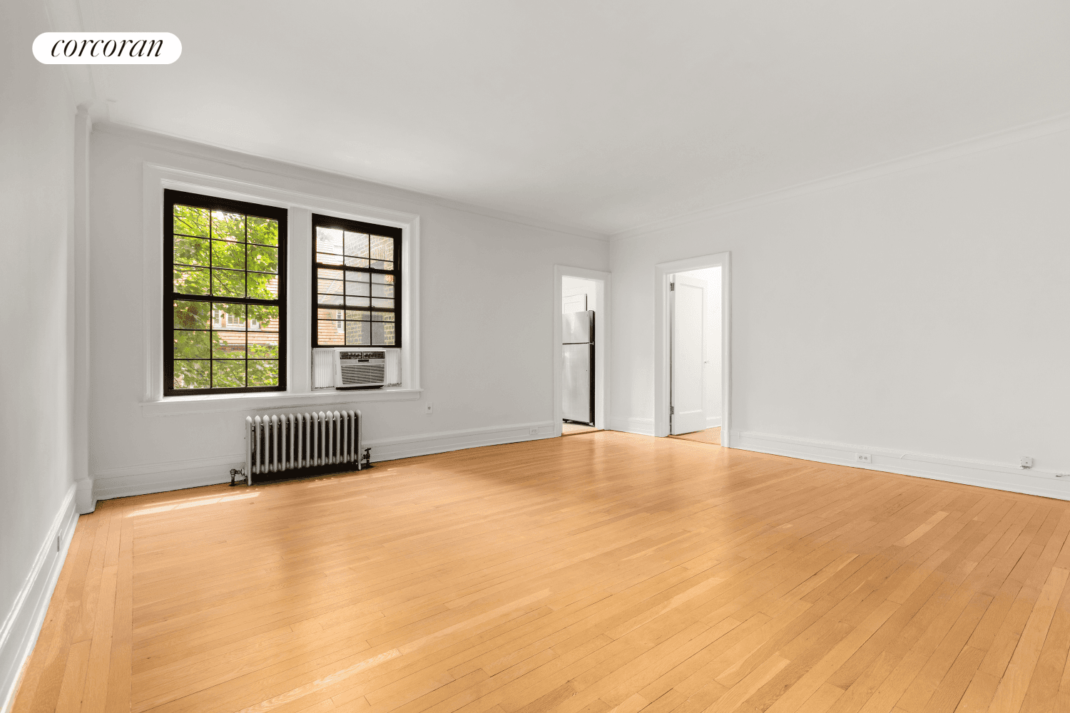 Come home to charm and warmth in Forest Hills Gardens !