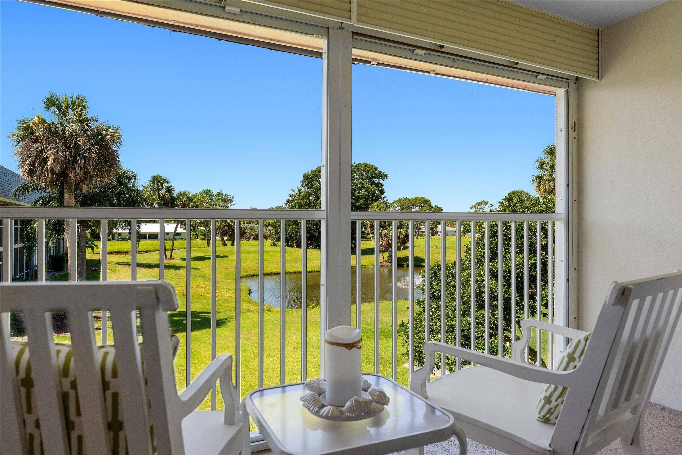 Welcome to this delightful 2 bedroom, 2 bathroom condo nestled in the serene 55 community of Little Club in Tequesta.