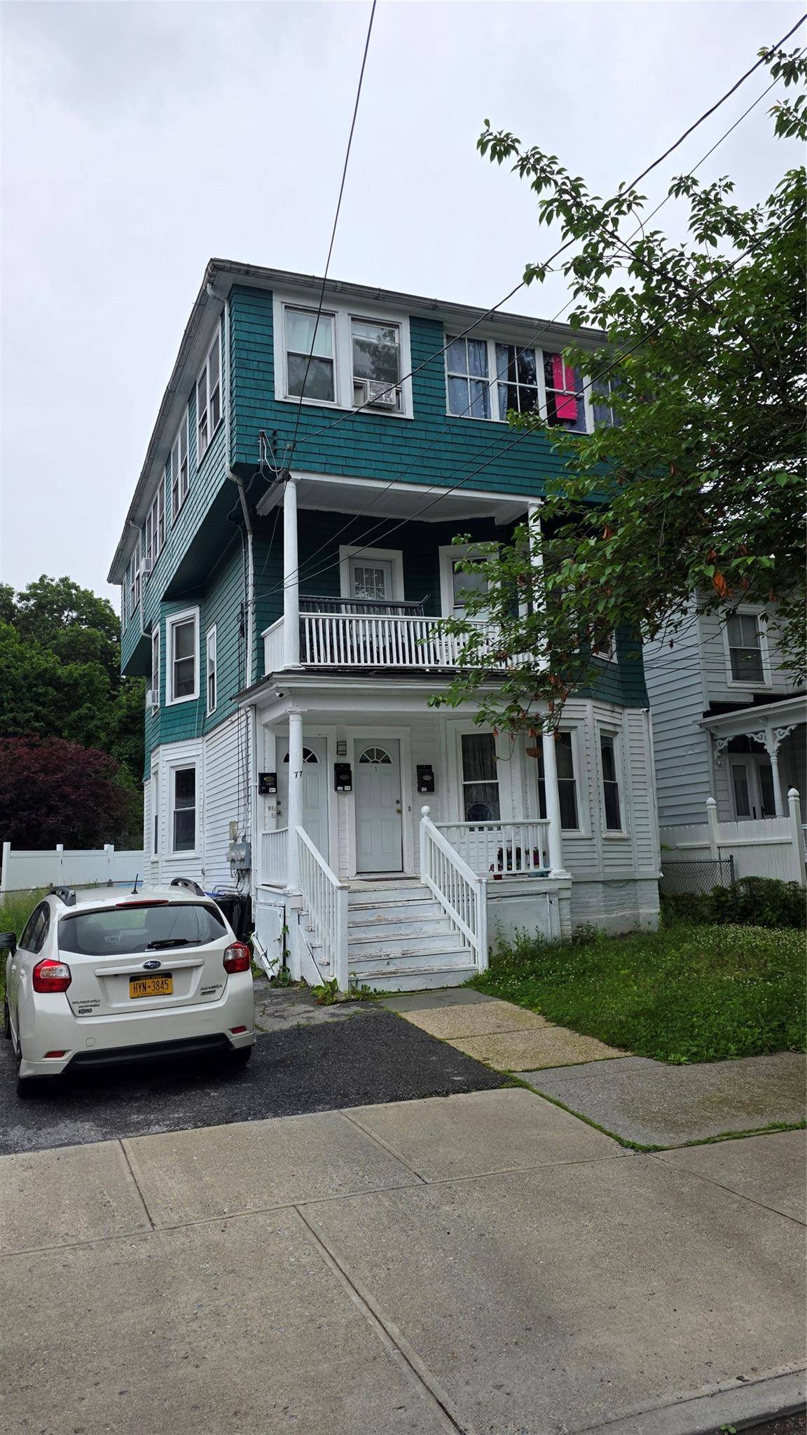 Three family home located on a quiet street in the desirable South Side of Poughkeepsie.